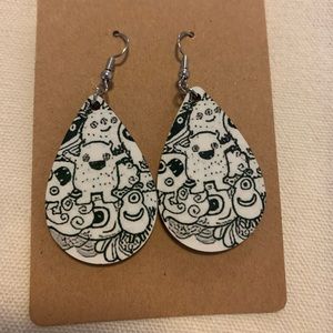 Monster dangle earrings